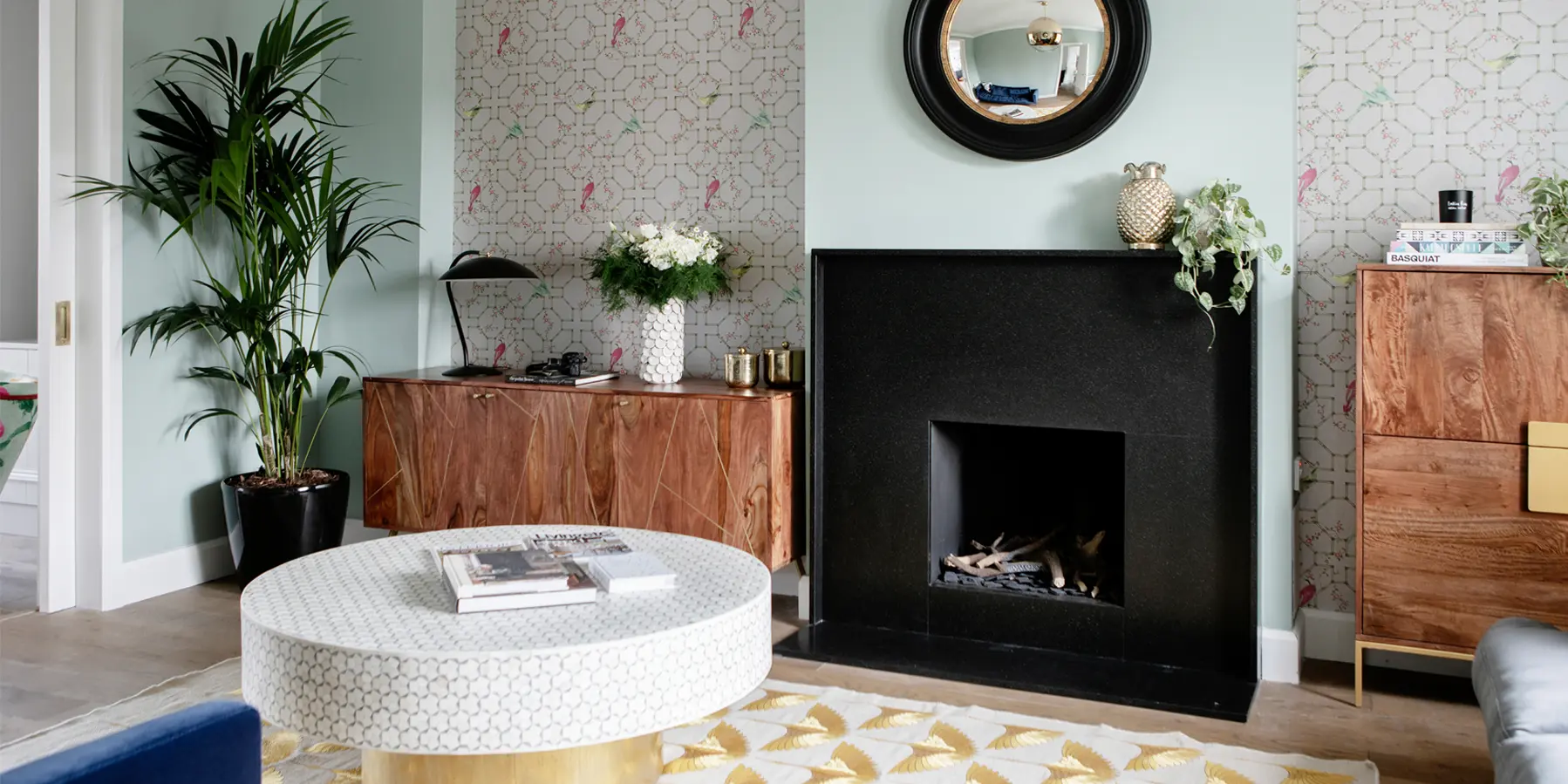Second slide showing colourful room with pastels and pink patterned wallpaper